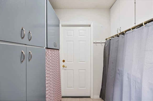 interior space with a textured ceiling