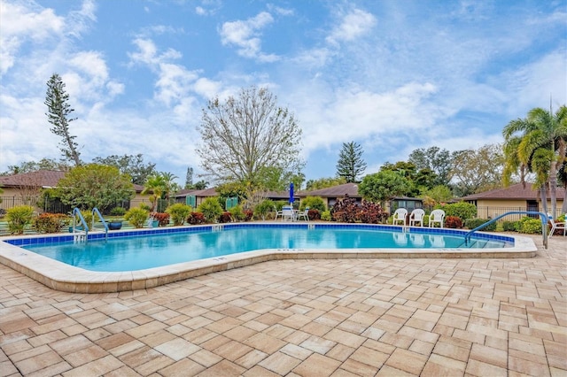 view of pool with a patio area