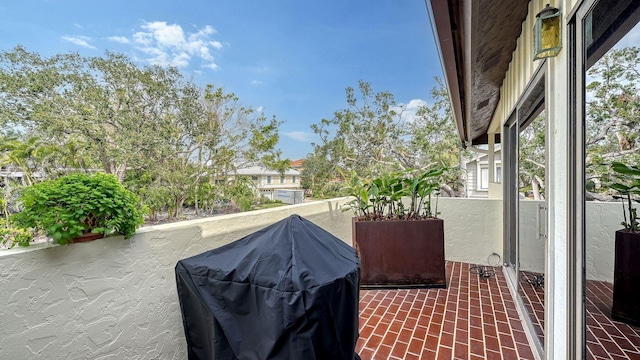 view of patio / terrace featuring a balcony and grilling area