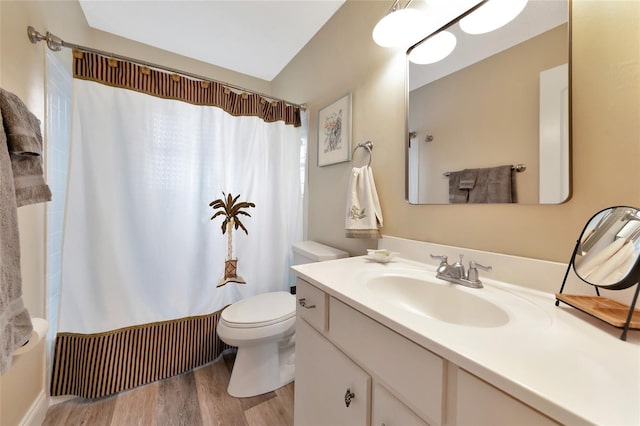 full bathroom featuring vanity, toilet, shower / tub combo, and wood-type flooring