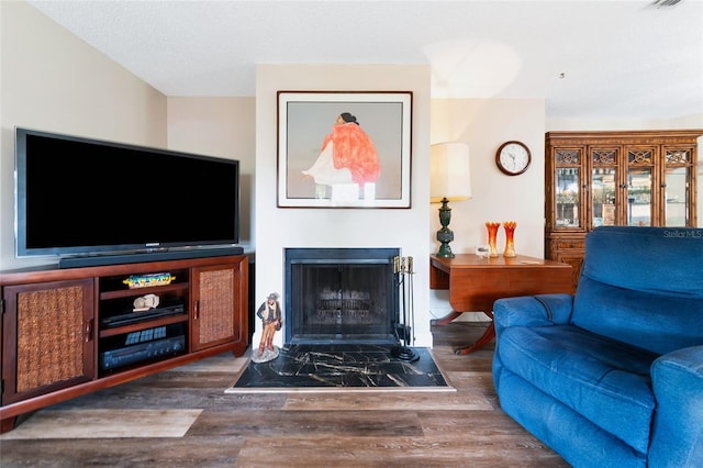 living room featuring dark hardwood / wood-style flooring