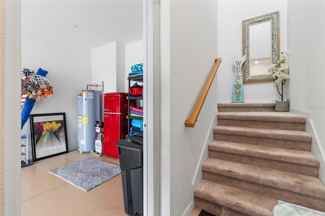 staircase featuring water heater