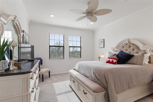 carpeted bedroom with ceiling fan, ornamental molding, and multiple windows