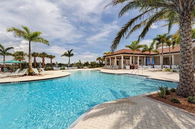 view of swimming pool featuring a patio area