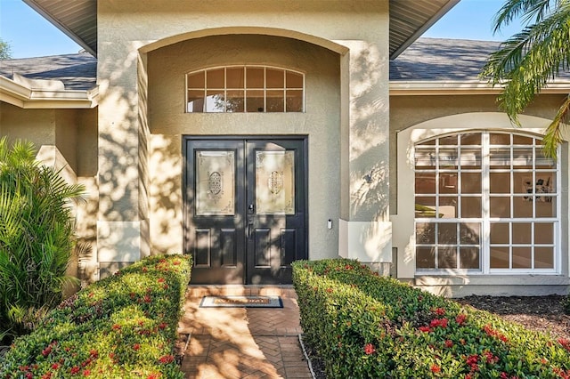 entrance to property featuring french doors