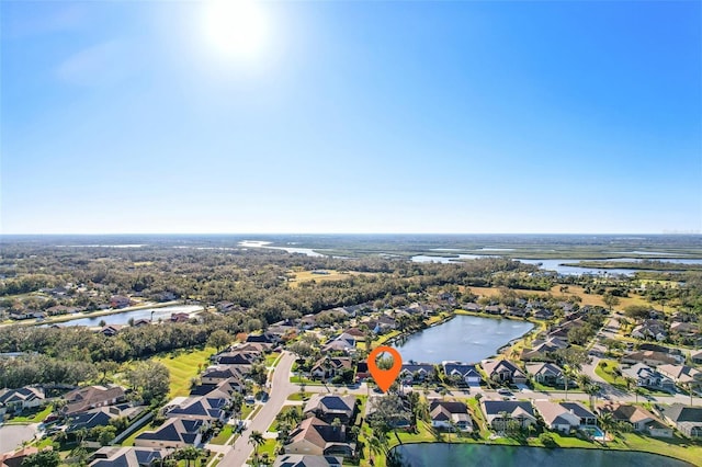 drone / aerial view with a water view