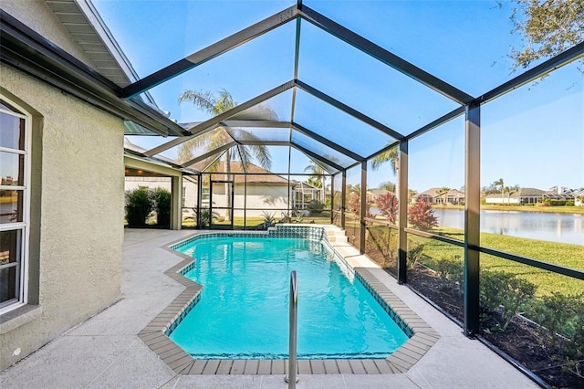 view of pool with a lanai, a patio, and a water view