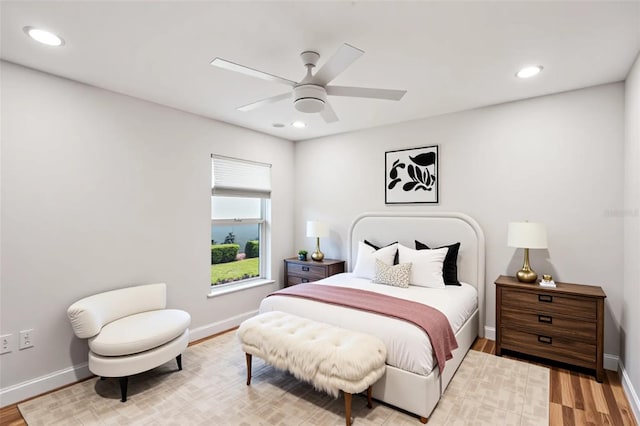 bedroom featuring recessed lighting, light wood-style flooring, and baseboards