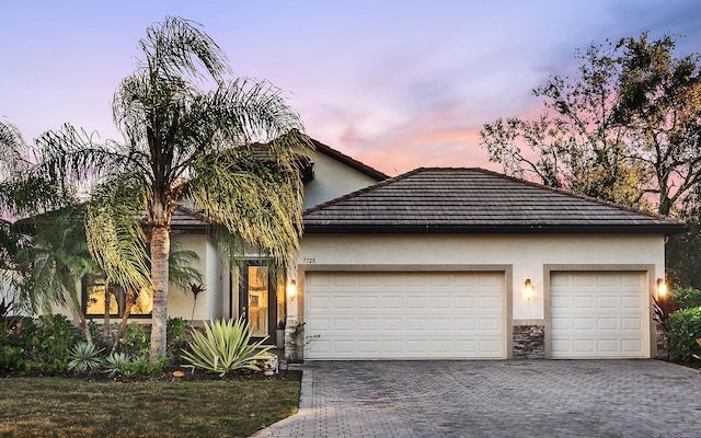 view of front of property featuring a garage