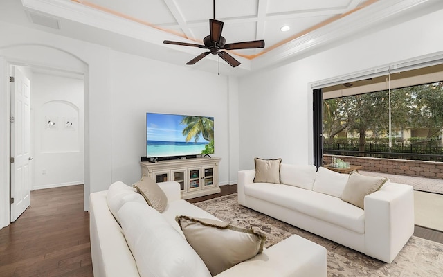 living room featuring crown molding, wood-type flooring, coffered ceiling, and beamed ceiling