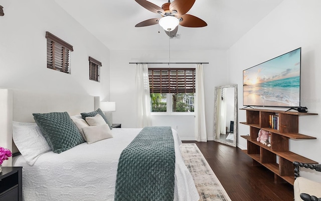 bedroom featuring dark wood-type flooring and ceiling fan