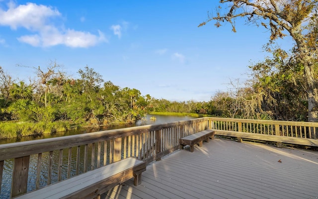 wooden terrace with a water view