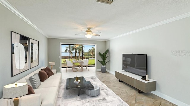 living room featuring crown molding, ceiling fan, and light tile patterned flooring