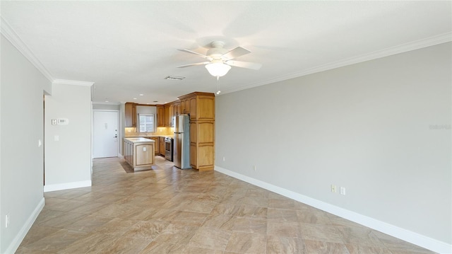 unfurnished living room featuring ceiling fan and ornamental molding