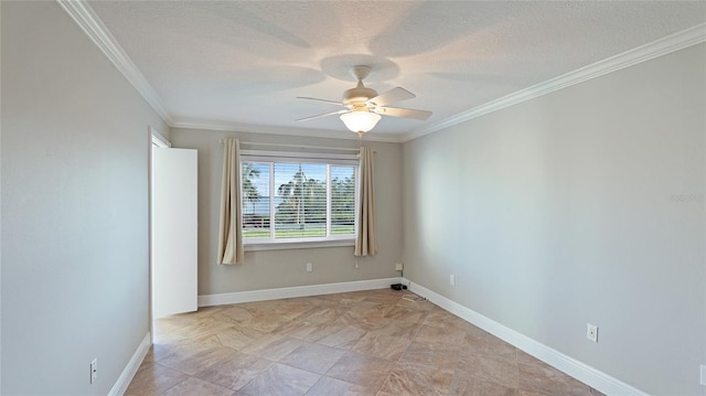 spare room with crown molding, a textured ceiling, and ceiling fan