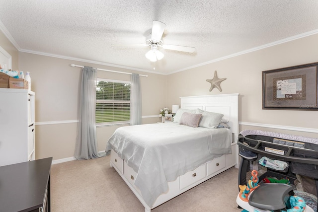 carpeted bedroom with ceiling fan, a textured ceiling, and ornamental molding