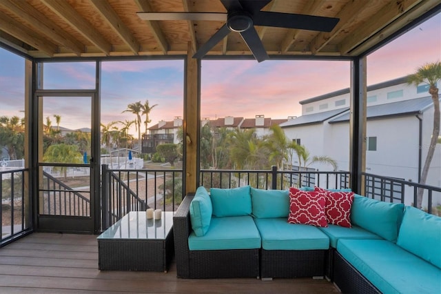 exterior space with ceiling fan and a residential view