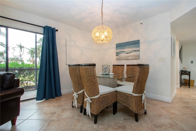 dining space featuring a chandelier and light tile patterned floors