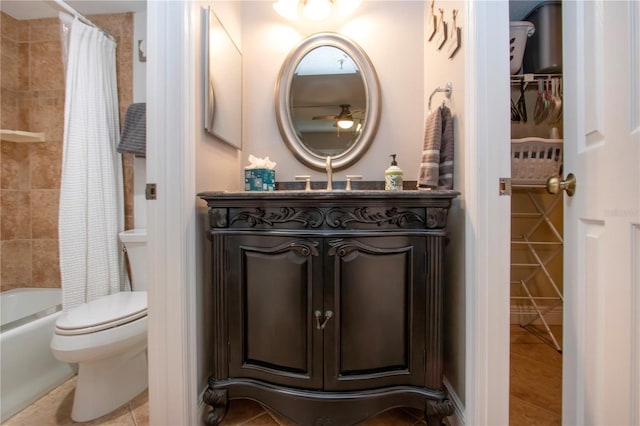 full bathroom with vanity, tile patterned floors, toilet, and shower / bath combo