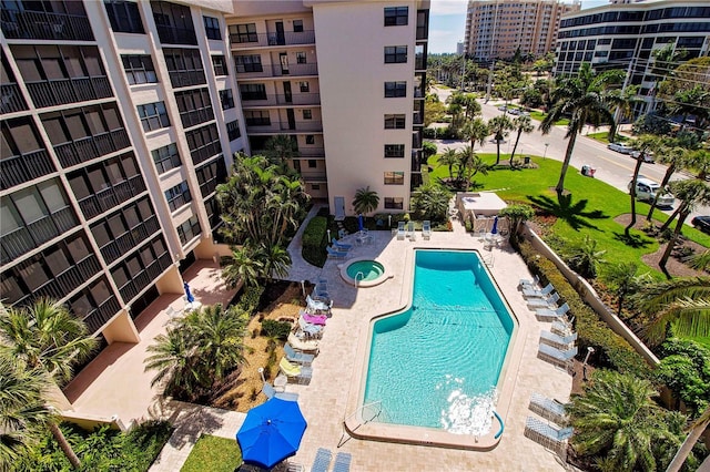 view of swimming pool with a patio