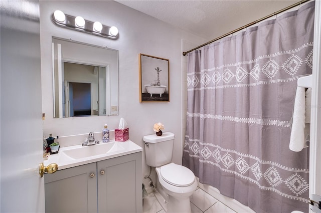 bathroom featuring vanity, a shower with curtain, toilet, and a textured ceiling