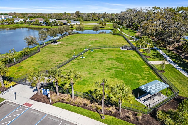 birds eye view of property with a water view