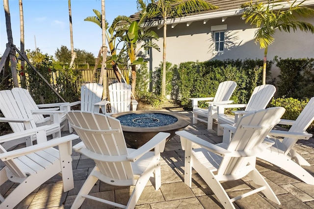 view of patio featuring a fire pit