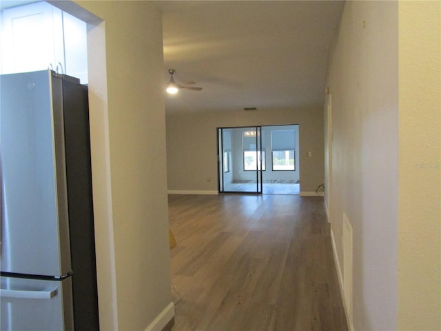 hall featuring dark wood-type flooring