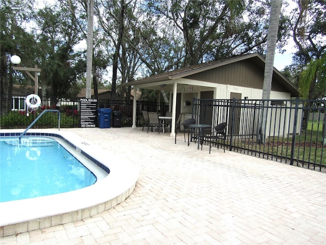 view of pool with a patio area