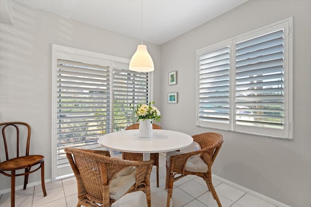 dining area featuring a healthy amount of sunlight and light tile patterned flooring