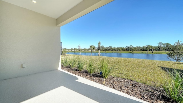 view of patio / terrace featuring a water view