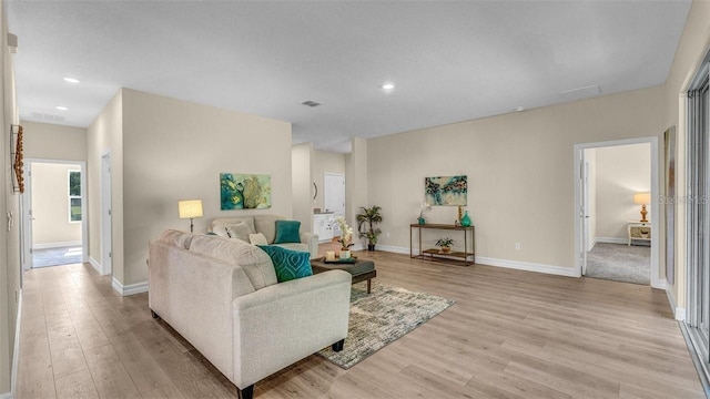 living room featuring light hardwood / wood-style floors