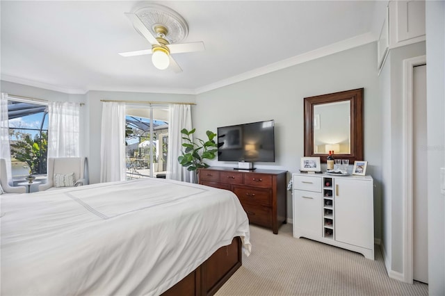 bedroom with access to exterior, crown molding, light colored carpet, and ceiling fan