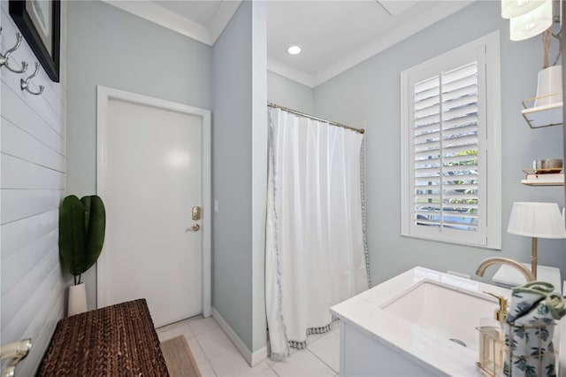 bathroom featuring vanity, curtained shower, ornamental molding, and tile patterned floors