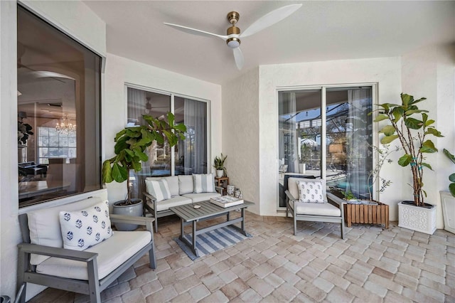 view of patio featuring an outdoor hangout area and ceiling fan