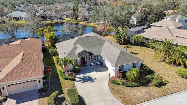 drone / aerial view with a water view