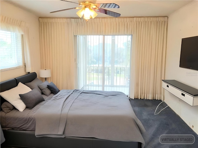 bedroom with ceiling fan and carpet floors