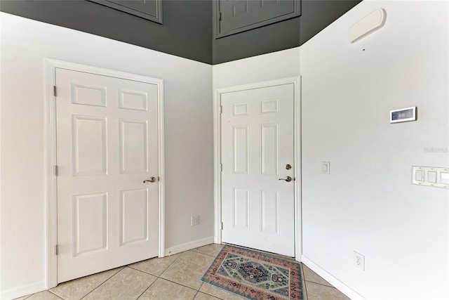 view of tiled foyer entrance