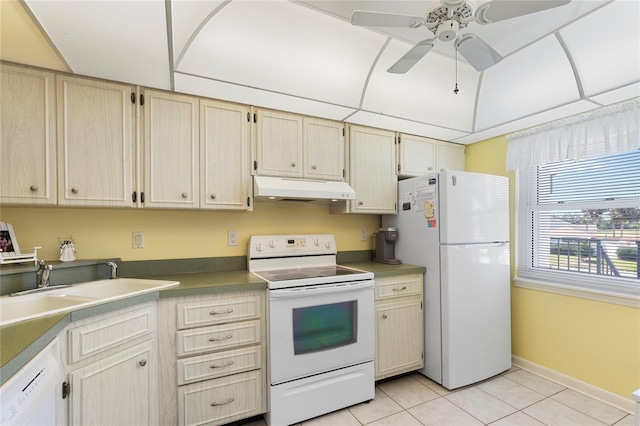 kitchen with sink, white appliances, ceiling fan, light tile patterned flooring, and light brown cabinets