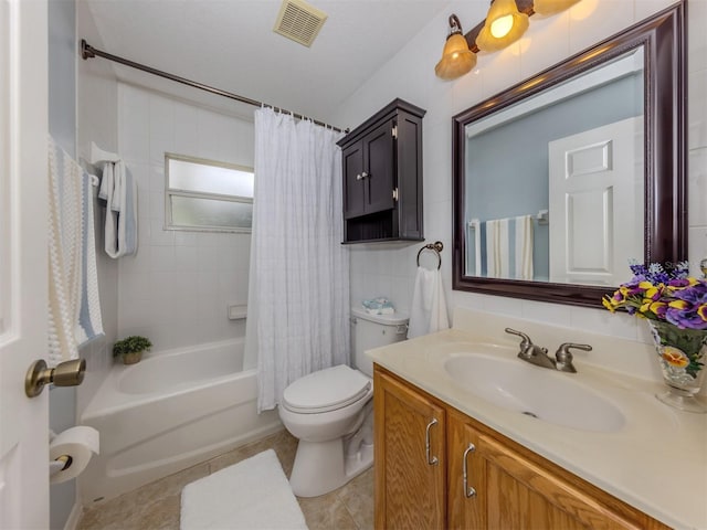 full bathroom featuring shower / bath combo, toilet, tile patterned flooring, and vanity