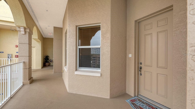 doorway to property featuring a balcony