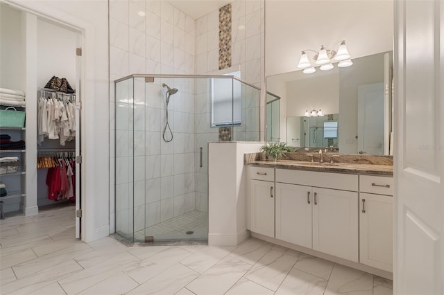 bathroom with vanity and walk in shower