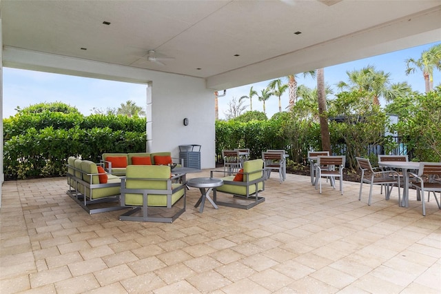 view of patio / terrace with ceiling fan and outdoor lounge area