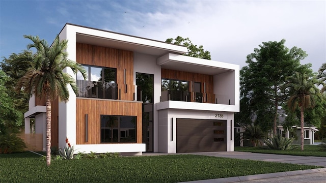 contemporary house featuring a front yard, a balcony, and a garage