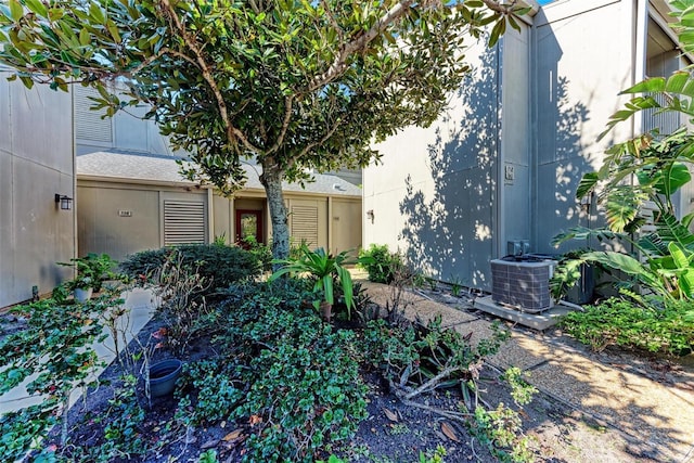 view of front of home with cooling unit