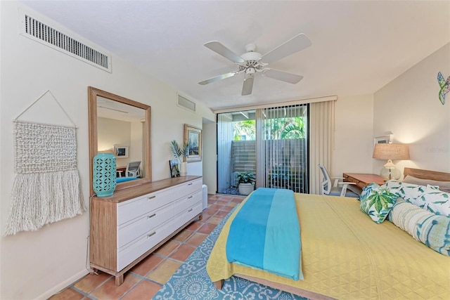 tiled bedroom featuring ceiling fan and access to outside