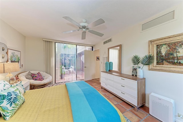 tiled bedroom with access to exterior, ceiling fan, and visible vents