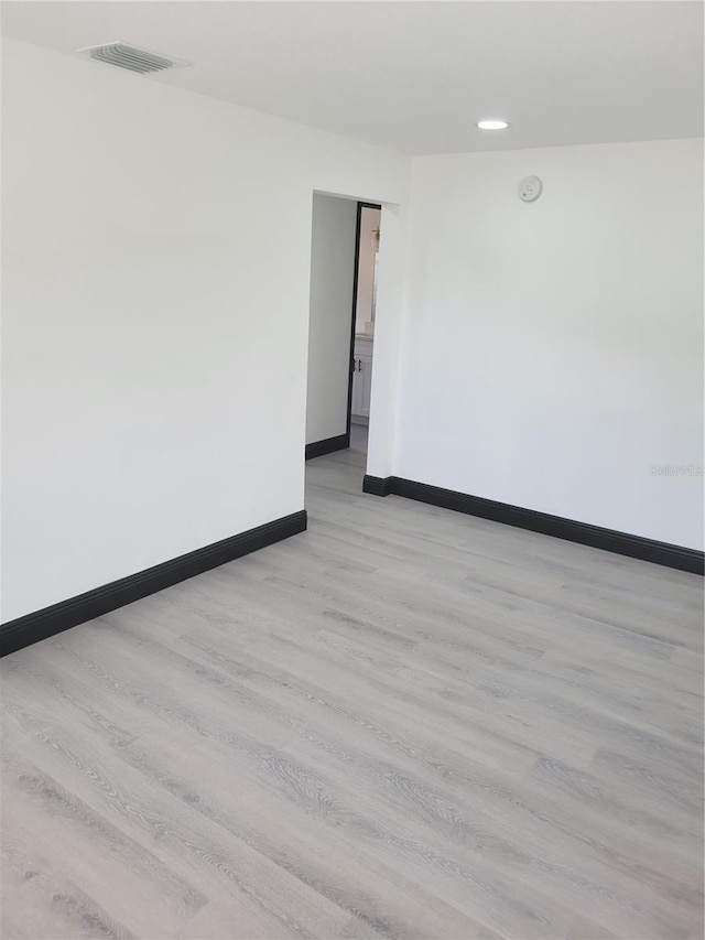 empty room featuring light wood-type flooring