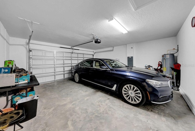 garage featuring electric panel, water heater, and a garage door opener