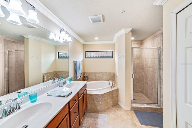 bathroom featuring tile patterned flooring, ornamental molding, and separate shower and tub